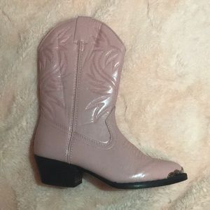 Pink cowgirl boots.